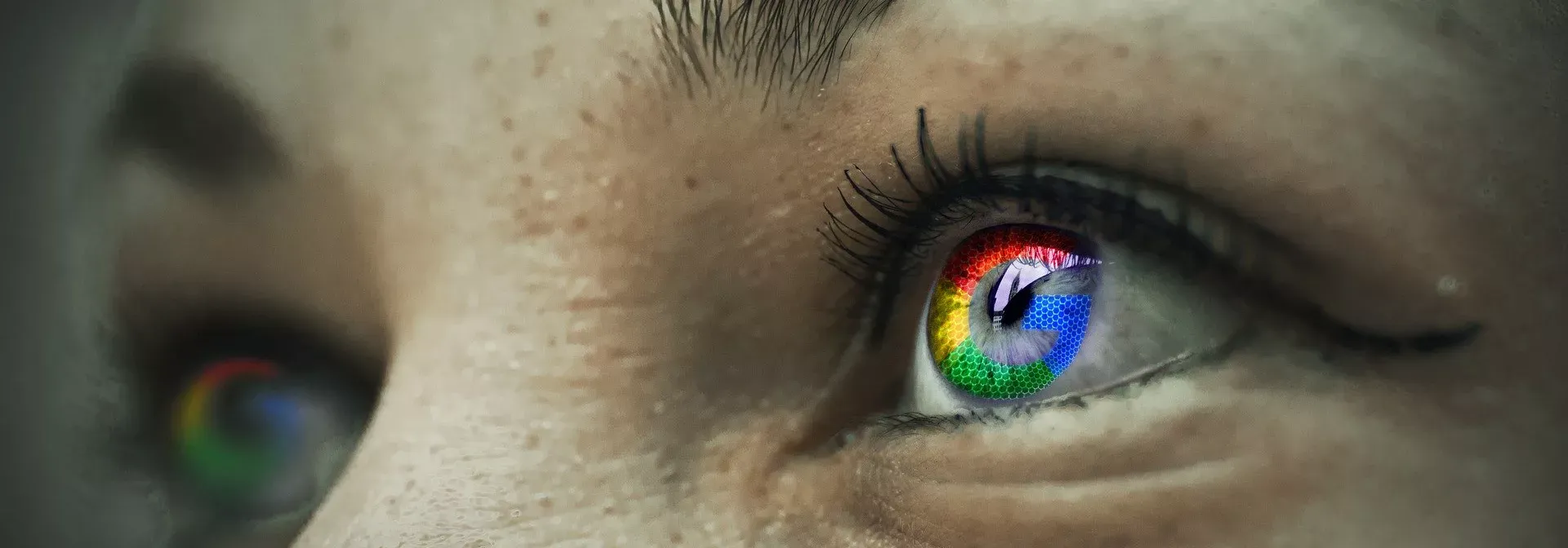 Close-up of an eye with an iris in Google’s colours