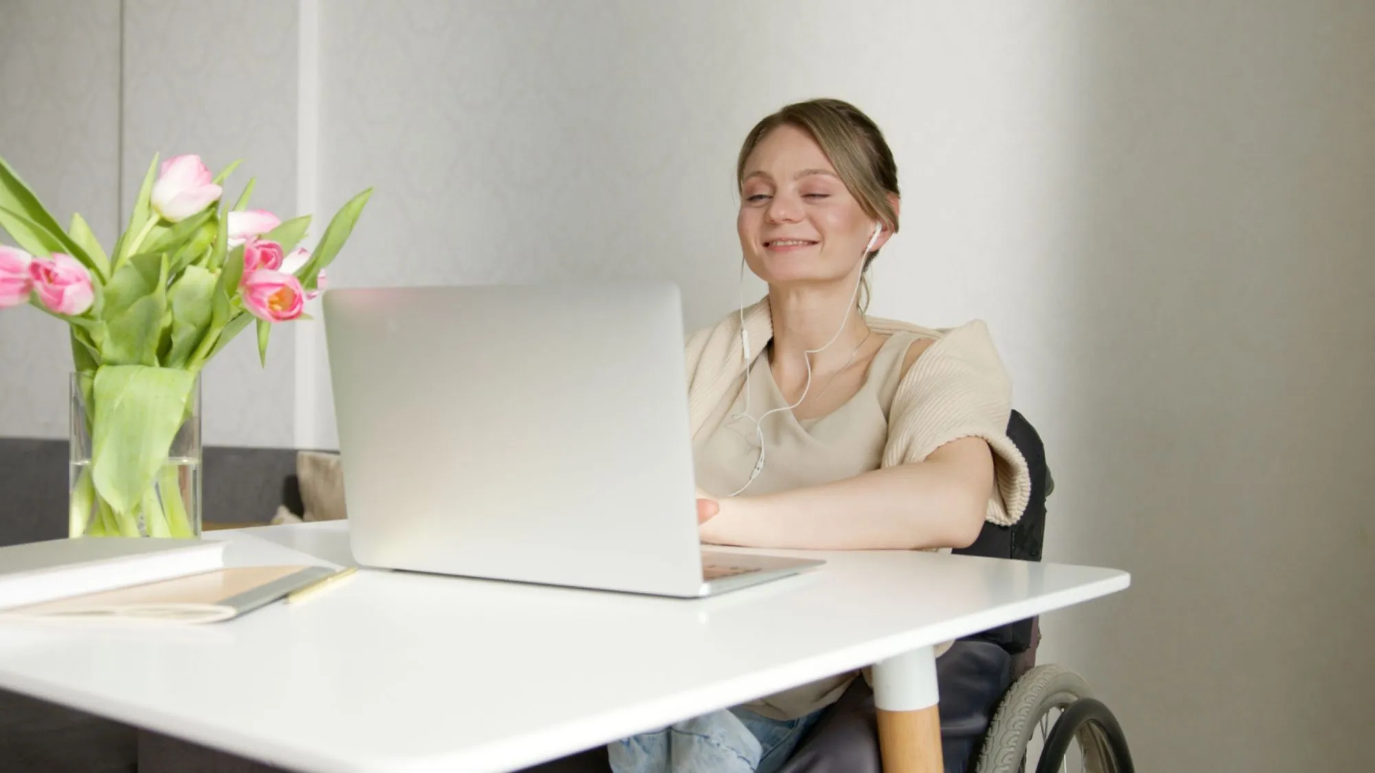 A person with access needs using a website built to the Web Content Accessibility Guidelines